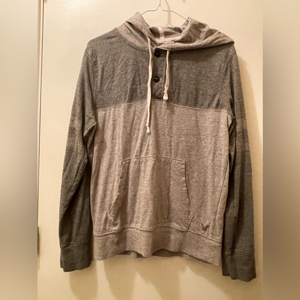 Light weight hoodie. Feels like t-shirt material.